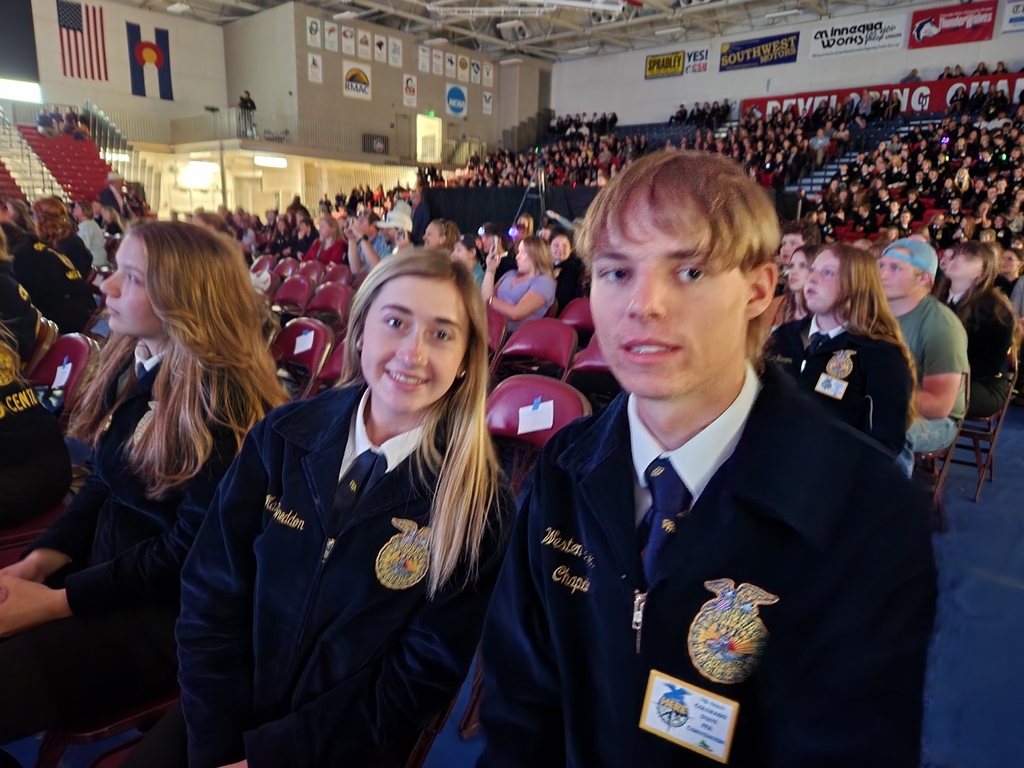 Two FFA members waiting for their State FFA Dgree  Award 